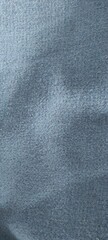 Textured Fabric Close-Up Featuring Soft Blue Hues and Subtle Light Reflections