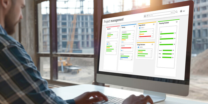 Project planning software for brisk business project management on the computer screen showing timeline chart of the team project