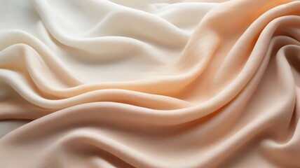 Obraz premium Close up of beige silk fabric with soft folds and gentle waves