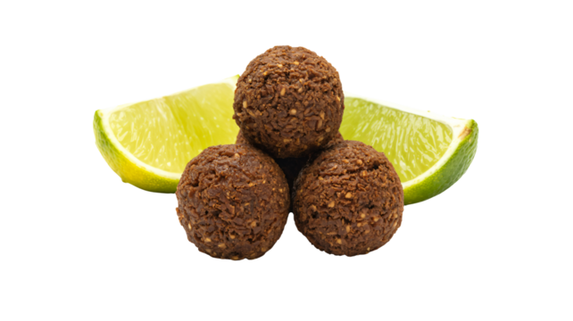 Delicious energy balls with vibrant lime slices perfect for healthy snacking, post workout fuel, or a sweet treat