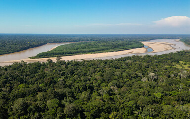 AERIAL VIEW OF THE MADRE DE DIOS RIVER NEAR THE TAMBOPATA NATIONAL RESERVE, BIODIVERSITY AND LARGE TREES AND RAINFORESTS OF THE AMAZON