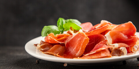 jamon serrano meat appetizer jamon iberico natural product tasty snack fresh delicious gourmet food background on the table rustic top view copy space