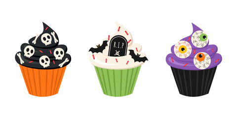 Halloween cupcake set. A sweet and spooky holiday dessert featuring an eyeball, tombstone, skulls, and bats.