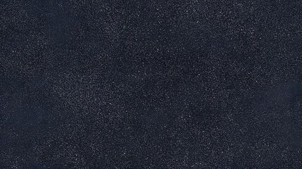 Dark textured background with subtle shimmering particles and light gradients.