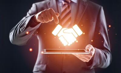 Trusted partner. Businessman hold handshake icon