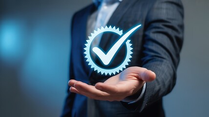 Hand holding glowing checkmark symbol representing quality and approval