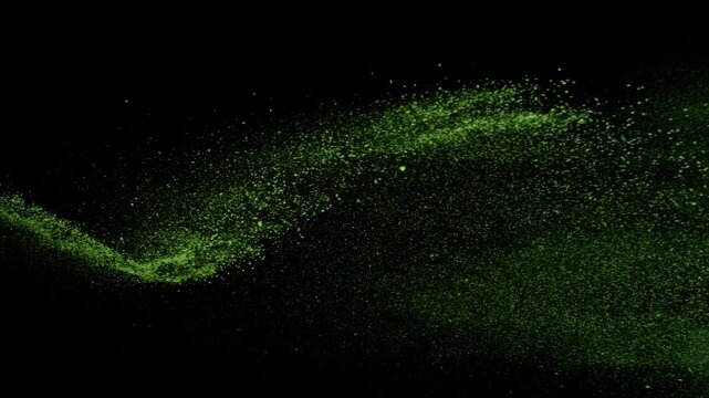 Super Slow Motion Shot of Flying Green Matcha Powder , Isolated on Black Background , Filmed on High Speed Cinematic Camera at 1000 FPS