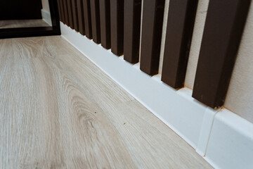 Explore Elegant Interior Design with Stylish Baseboards and beautiful Wall Paneling for a...