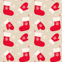 Seamless Christmas pattern. Red mittens and a sock with a snowflake.