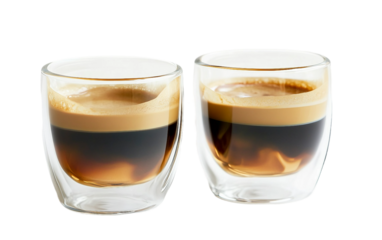 Detailed view of espresso crema forming on top of freshly extracted shot in glass set isolated on transparent background PNG
