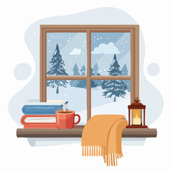 Cozy winter windowsill with a hot drink books a blanket and a lantern overlooking a snowy forest scene.