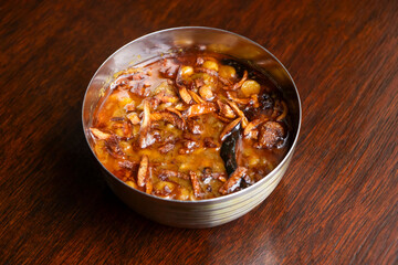Dal Butter Fry with Creamy Lentil Curry Topped with Ghee and Onion Tadka in bowl side view of bangladeshi food