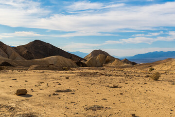 Striped Eroded Hills with Rocky Foreground and Distant Valley View, 20 Mule Team Canyon, Death Valley National Park