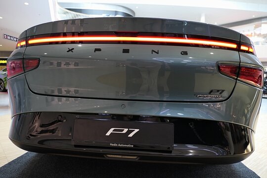 Rear view of modern chinese battery electric executive sedan XPeng P7, displayed on car expo in Bory Mall Bratislava, Slovakia, september 2025.  