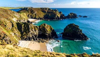 Coastal panorama of dramatic cliffs, inlets, and a sandy beach