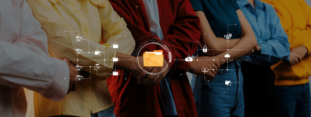 A diverse group of individuals standing together, showcasing unity through hand-holding, surrounded by digital icons representing technology and collaboration in the modern world. Trope