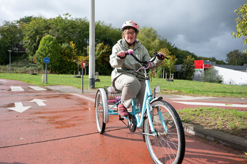 Portrait of a happy 43 yo woman with Down Syndrome, Tienen, Belgium
