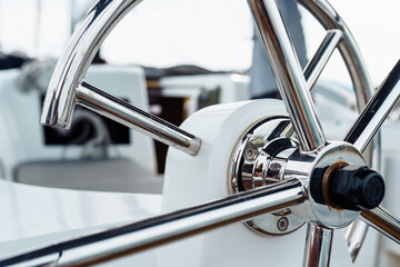 Obraz premium steering wheel on a yacht