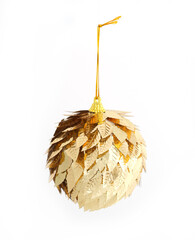 Golden leaf Christmas ornament isolated on a white background. Festive metallic holiday decoration with a leaf texture.
