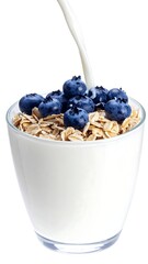 Oatmeal with blueberries and milk in a glass bowl