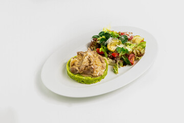 Beef stroganoff with green puree and fresh salad