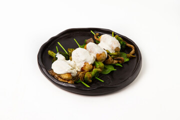 Delicious gourmet dish with meat and creamy sauce