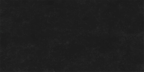 An old, rough black chalkboard with a dark texture and blank surface for a wallpaper or design background © PAGLAA