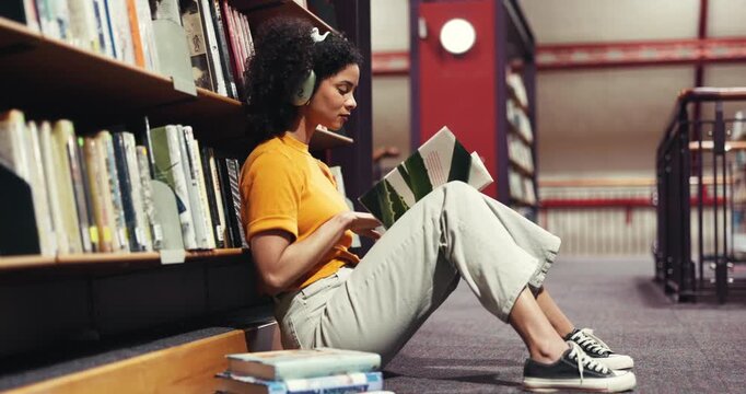 Reading, book and woman with headphones, library and assignment preparation with literature or info. Learning, university student and person with tech to block distractions, education and knowledge