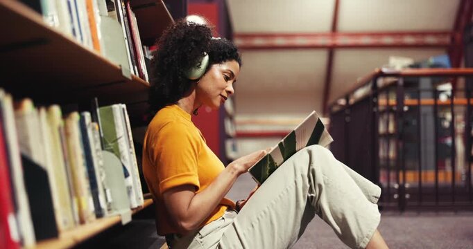 Education, book and woman with headphones, library or reading literature for exam, serious and study. Learning, university student and person with tech to block distractions, fiction and knowledge