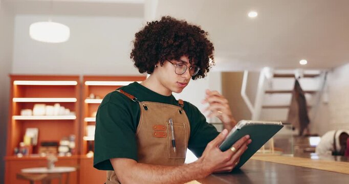 Thinking, owner and man at restaurant with tablet, menu development and planning for small business. Research food trend, tech and entrepreneur reading in kitchen, recipe creation and culinary ideas.