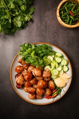 Griled Isaan sausages in a white plate ,Thai called sai krok isan	