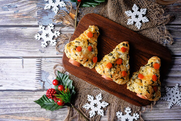 Basil cheese garlic sausage Puff pastry pies in the form of Christmas tree for Christmas holidays
