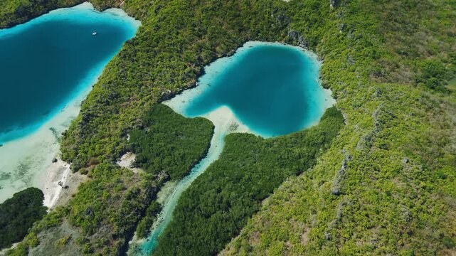 Aerial view of the blue lake in Indonesia. The Nirwana lake, Telaga Nirwana, located on Rote island in Indonesia