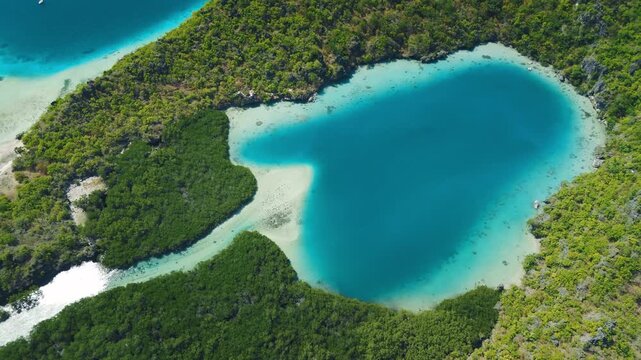 Aerial view of the blue lake in Indonesia. The Nirwana lake, Telaga Nirwana, located on Rote island in Indonesia