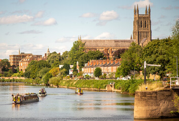 Fototapeta premium Narrow boats drifting up the River Severn from Diglis Locks,at Worcester,England,UK.