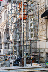 Fototapeta premium Steel scaffolding set up for facade restoration of a historic stone building
