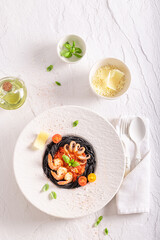 Exclusive spaghetti bolognese decorated with herbs and parmesan.