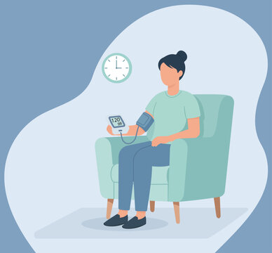A woman sits in a chair, monitoring her blood pressure at home, illustrating the concept of health self-management and regular medical check-ups