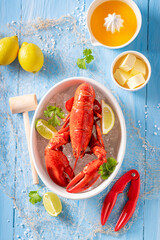 Steamed lobster as mediterranean summer meal in restaurant.