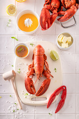 Steamed lobster prepared in orange and butter sauce.