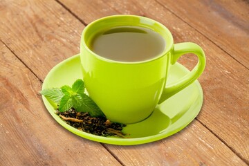 Tasty aroma Black tea in ceramic cup on desk