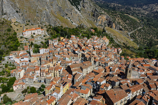 Aerial drone view of Isnello historic Sicilian mountain village with traditional stone buildings and old architecture in summer Madonie Natural Park Sicily Italy Mediterranean landscape panorama - Powered by Adobe
