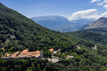 Obraz premium Aerial drone view of Gibilmanna historic Christian sanctuary and pilgrimage site in Madonie Natural Park mountains near Cefalu on Pizzo Sant Angelo slope Sicily island southern Italy Europe