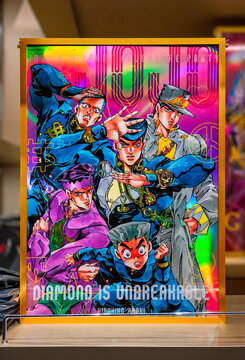 tokyo, shibuya - sep 14 2025: Holographic japanese poster featuring Josuke Higashikata from manga Jojo's Bizarre Adventure part 4 exhibited at THE★JOJO WORLD official shop of Parco by Bandai Namco.