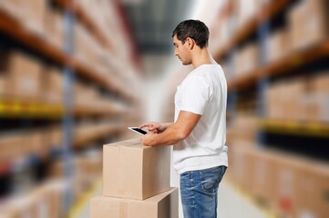 Male worker contractor in logistics store management,