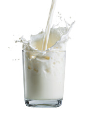 Milk pouring into a glass with a splash against a black background.