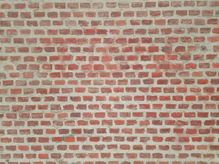 A wall of neat red brickwork. Space for creative text, advertising. Copy space 