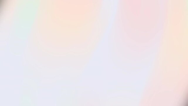 Soft pastel gradient with peach, pink, blue, and lavender melting into hazy, dreamy swirls and airy