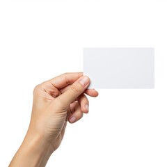 Obraz premium Person holds a blank white card in their hand against a white background.