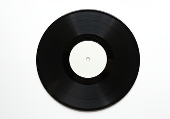 Black vinyl record with a blank white label is isolated on a white background.